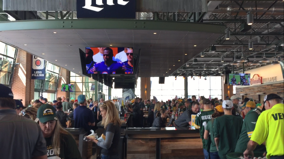 Football fans enjoy the new Johnsonville Tailgate Village WLUK