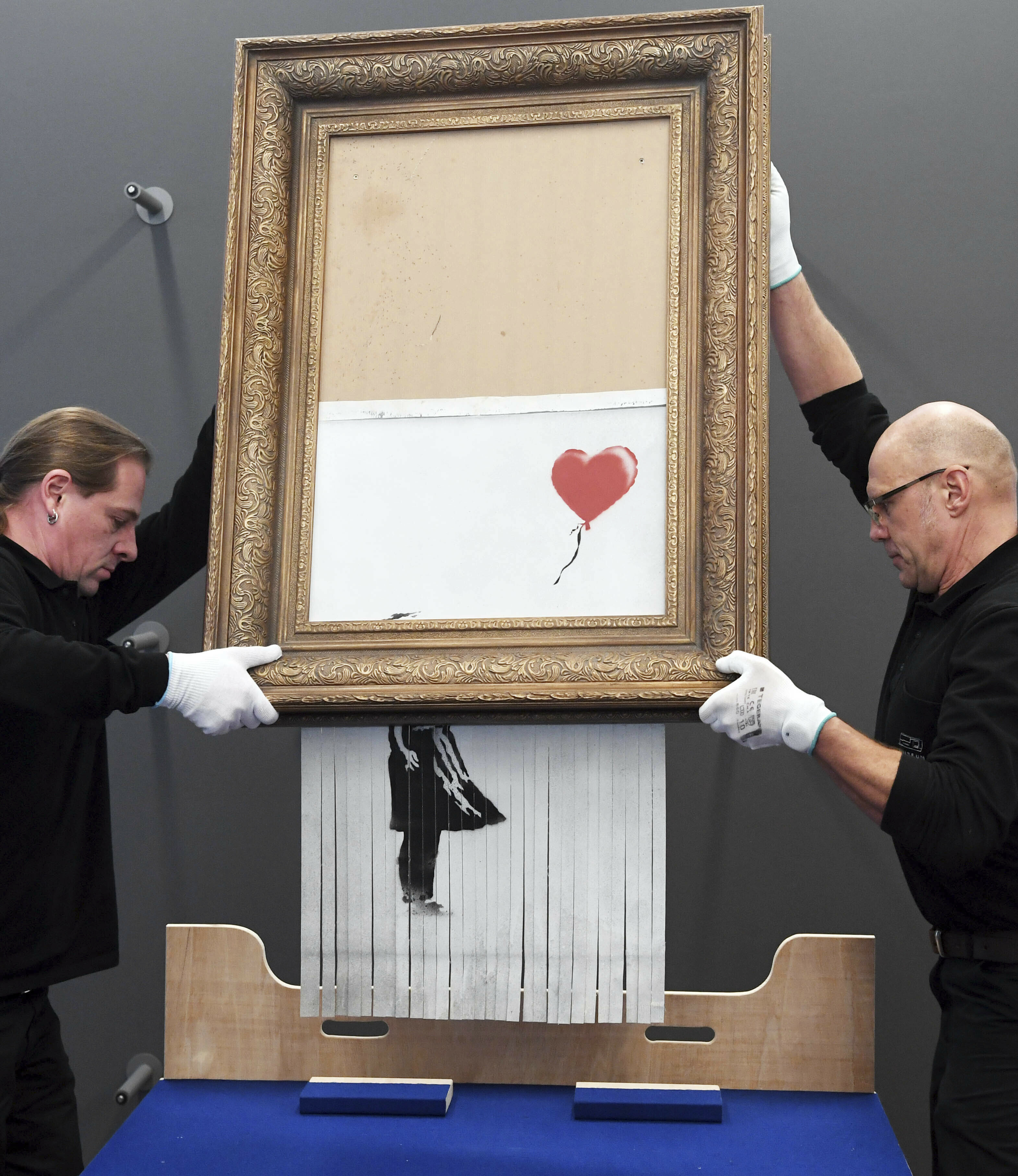 the shredded banksy painting 